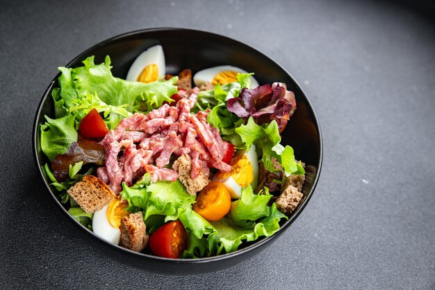 speksalade Vogezensalade ei crouton sla sla dressing vinaigrette Lotharingse keuken