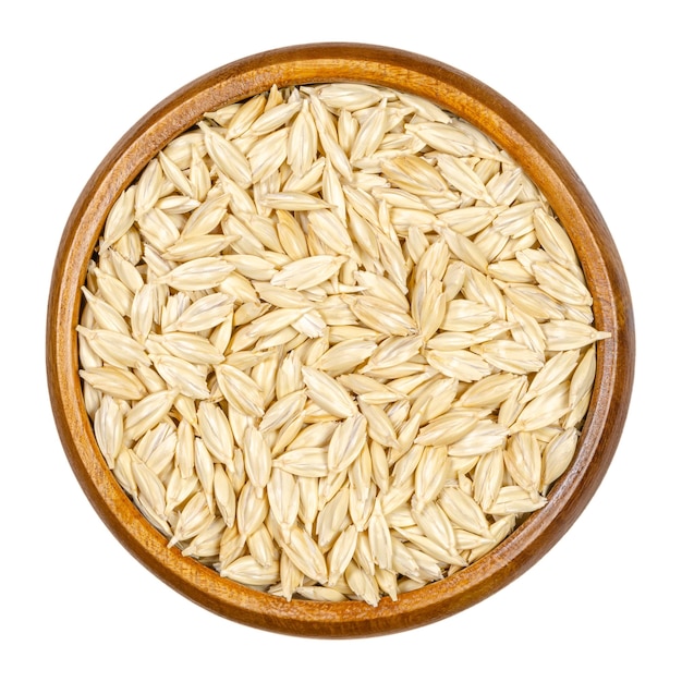 Spelt seeds in wooden bowl