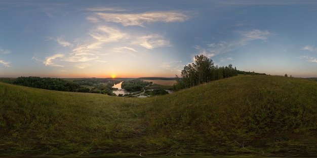 Spherical panorama from hill at summer sunset full view on 360 degree wide and 180 degree high