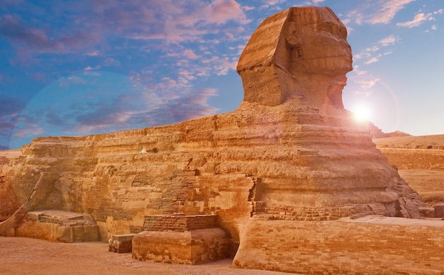 Sphinx against the backdrop of the great Egyptian pyramids Africa Giza Plateau