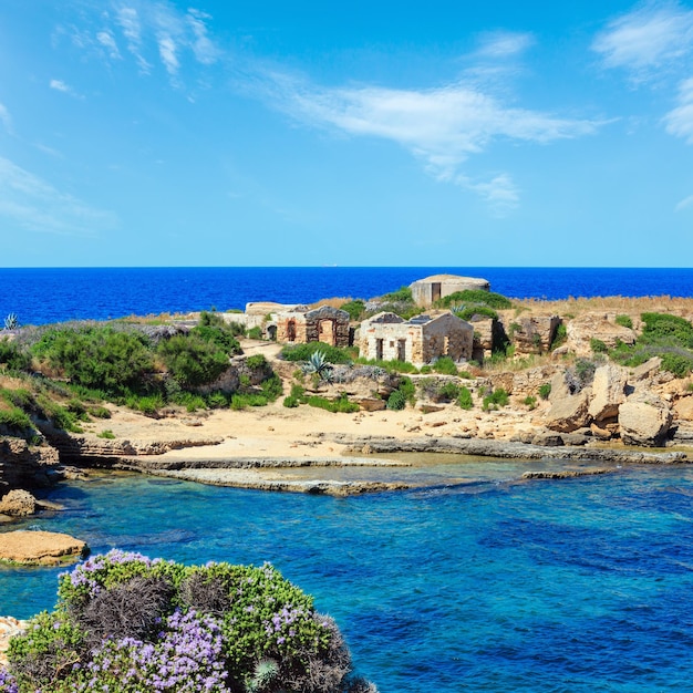 Spiaggia Massolivieri beach summer sea landscape and ruins Siracusa Sicily Italy