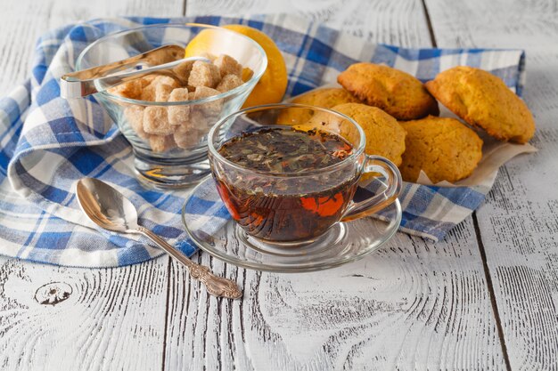 Spice pumpkin homemade cookies against wood background with ingredients