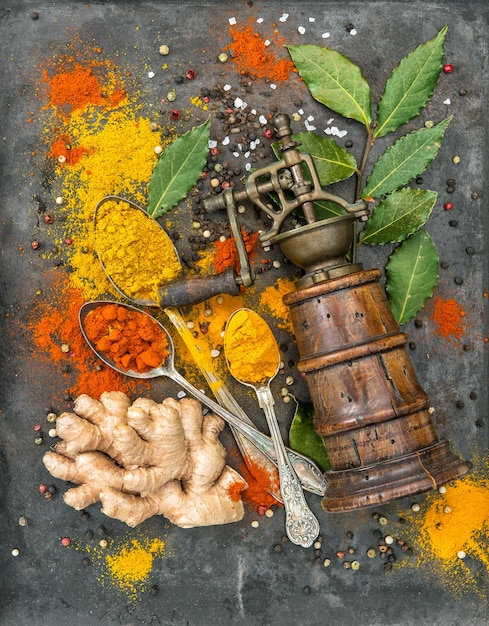 Spices curry, turmeric, ginger, bay leaf, paprika powder. Food background