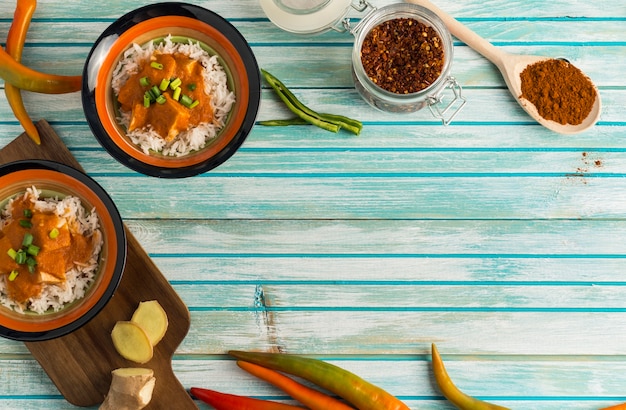 Spices and curry on wooden table