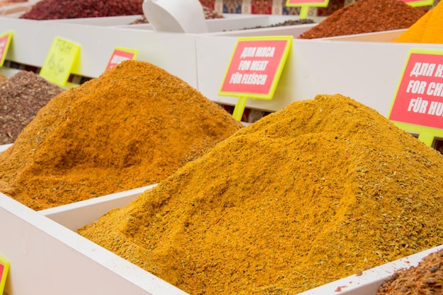 Spices on the eastern market Mountains of spices on the counter Oriental Bazaar