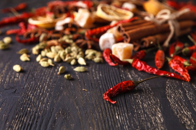 Spices and herbs on a black background