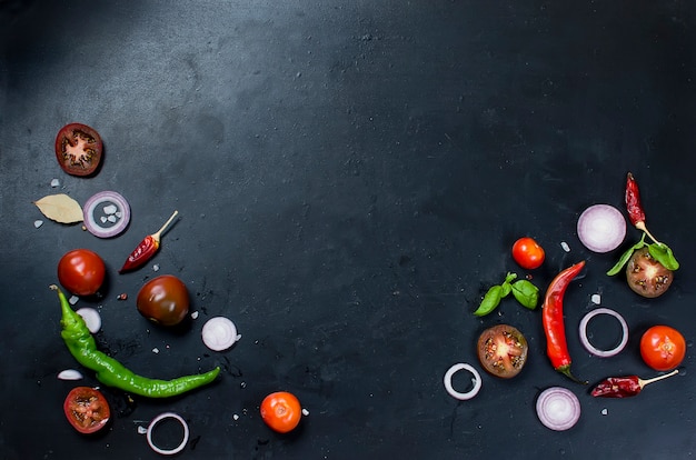 Spices and herbs for cooking dinner - ,slised tomato, onion, salt, pepper, garlic. 