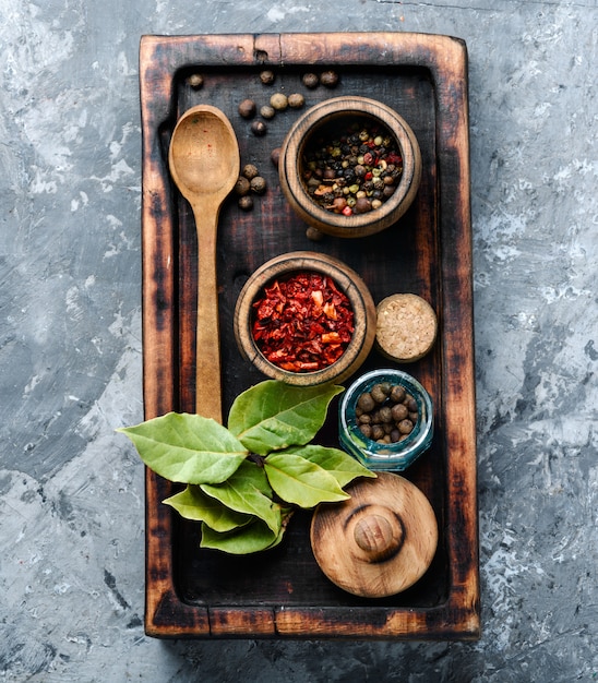 Spices and herbs on kitchen table