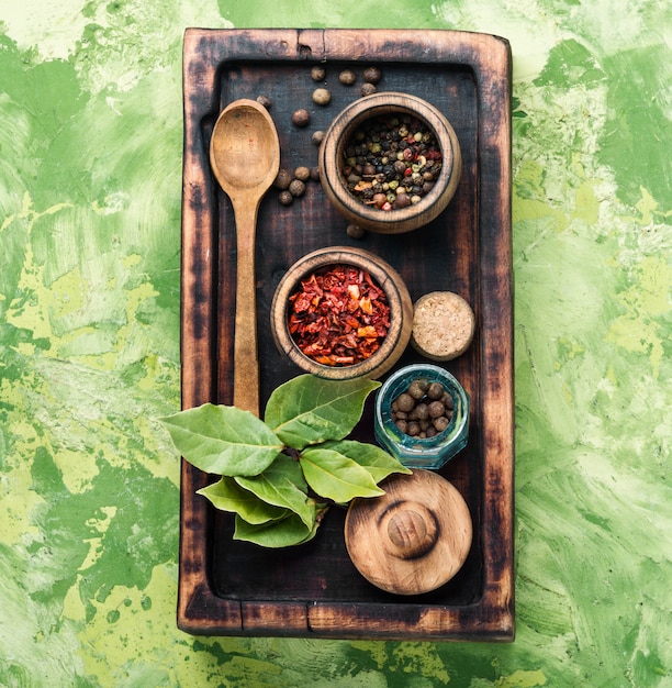 Spices and herbs on kitchen table