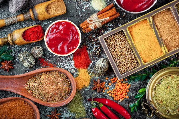 Spices and seasonings on a wooden table