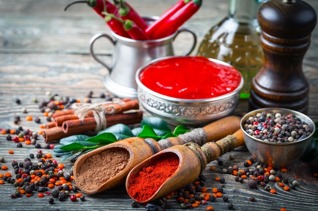 Spices and seasonings on a wooden table