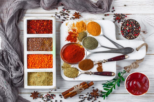 Spices and seasonings on a wooden table