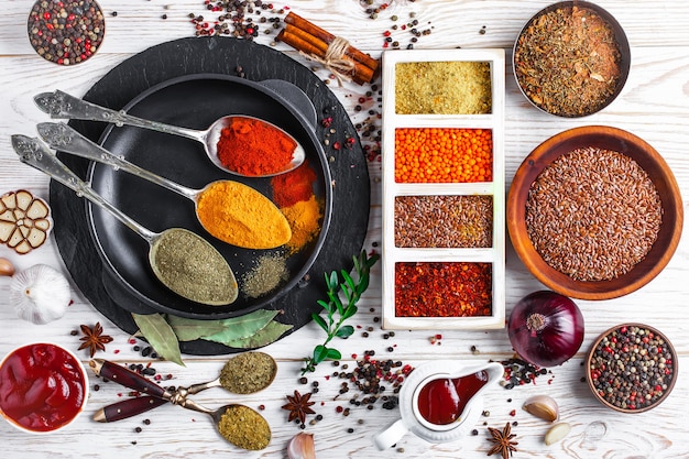 Spices and seasonings on a wooden table