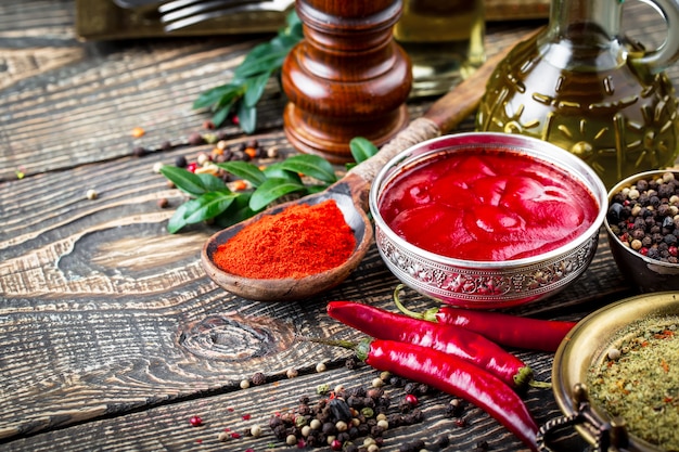 Spices and seasonings on a wooden table