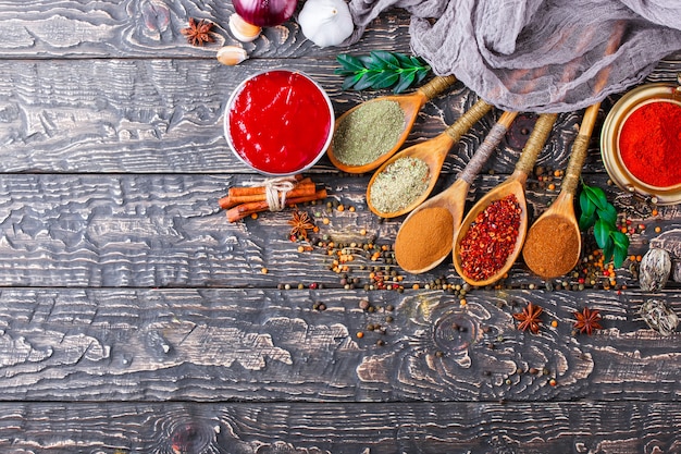 Spices and seasonings on a wooden table