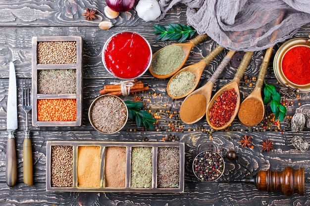 Spices and seasonings on a wooden table