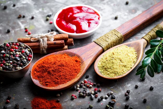 Spices and seasonings on a wooden table