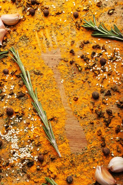 Spices on table with fork silhouette closeup