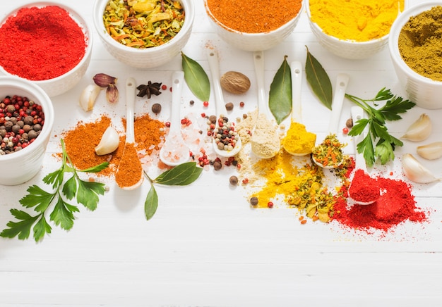 Spices on white table