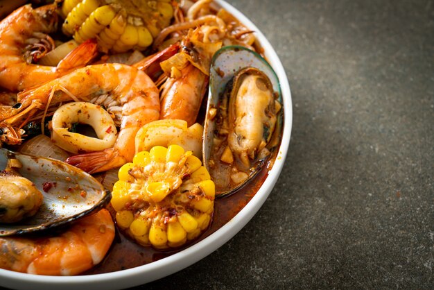 spicy barbecue seafood - shrimps, sqiud, mussel and corn