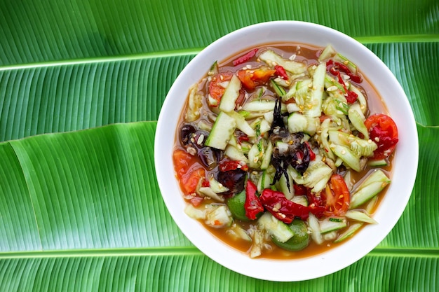 Spicy cucumber salad in plate