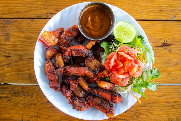 Spicy Fried Roasted Grilled Pork with Chutney Nepali Style