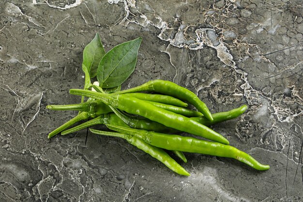 Spicy green chili pepper seasoning heap