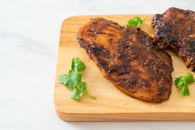 spicy grilled Jamaican jerk chicken - Jamaican food style