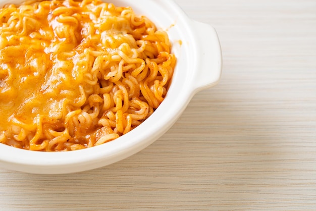 Spicy instant noodle with cheese