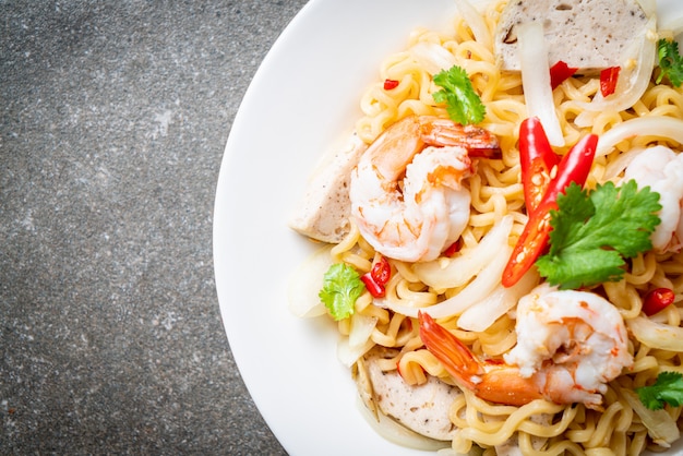 spicy instant noodles salad with shrimps