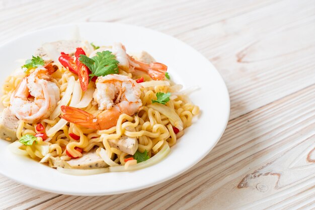 spicy instant noodles salad with shrimps