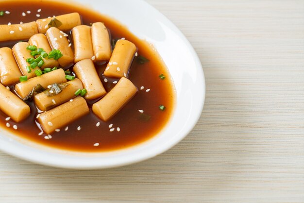 Spicy Jjajang Tteokbokki or Korean rice cake in spicy black bean sauce