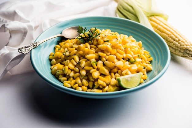 Spicy Masala Sweet Corn is a tasty roadside Indian snack, which is very easy to make. selective focus