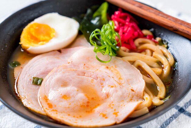 spicy miso udon ramen noodle with pork