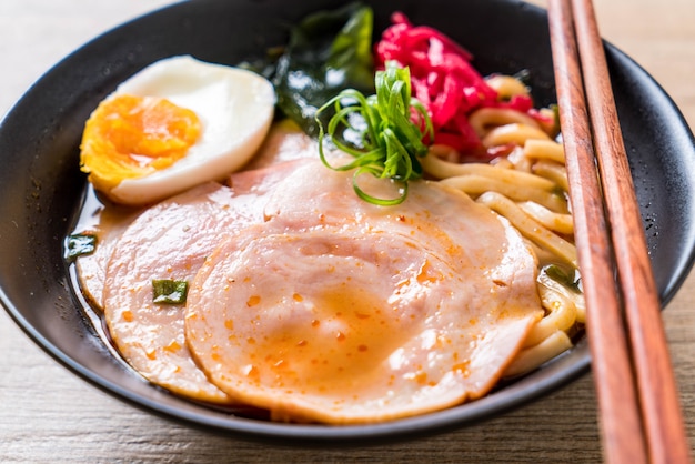 spicy miso udon ramen noodle with pork