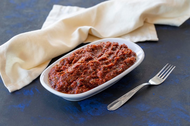 Spicy pastry appetizer harissa made with tomato pepper garlic
onion pepper paste and olive oil traditional middle eastern cuisine
flavors healthy vegetarian snack with main course acili ezme
adjika