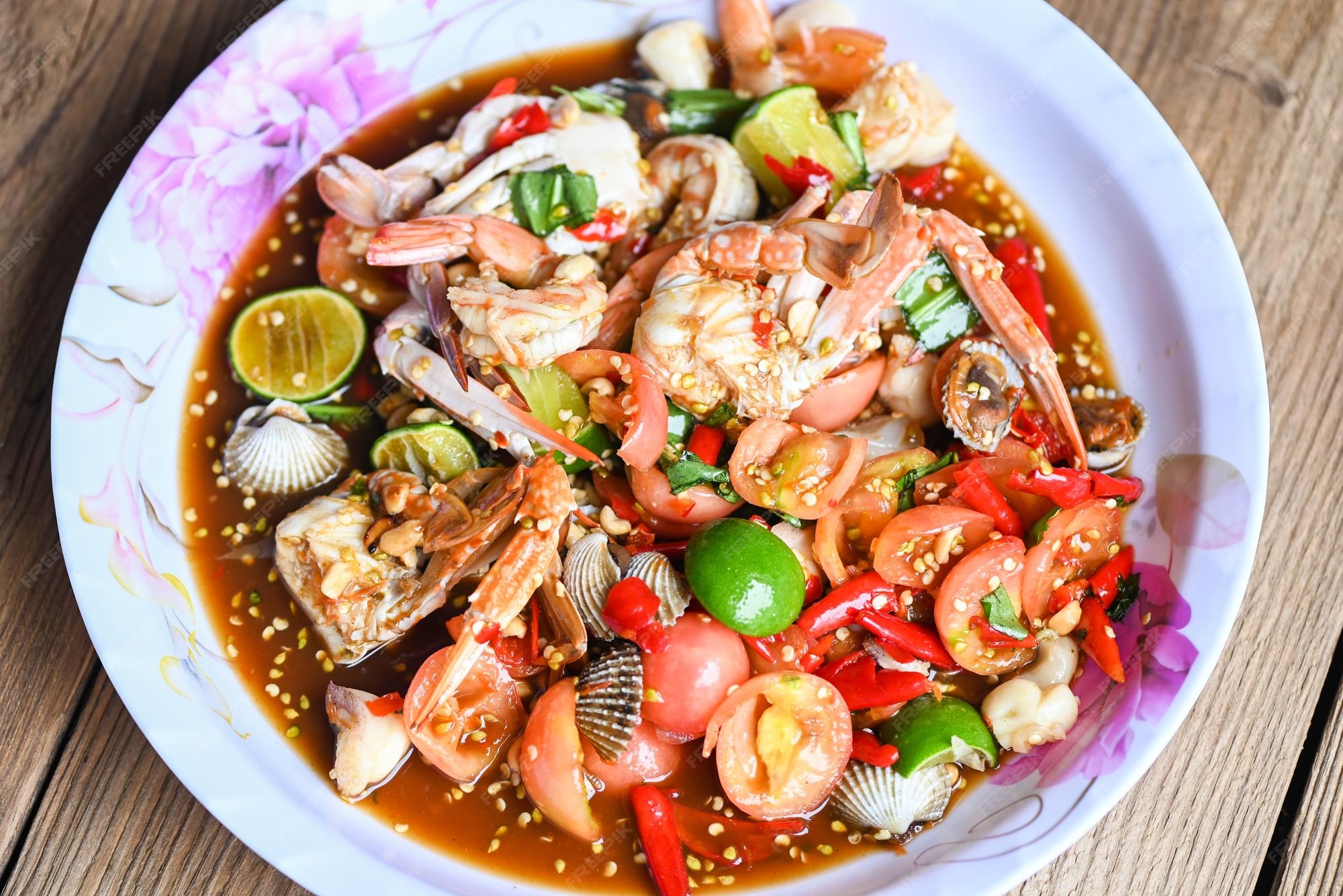 Premium Photo | Spicy salad seafood on tray Salad Thai cuisine spicy
