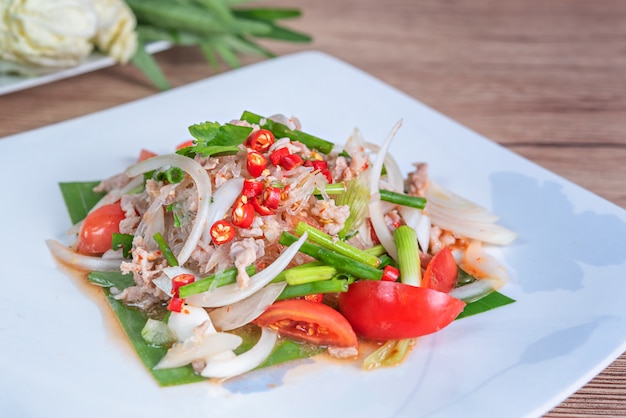 Spicy salad with minced pork and vermicelli