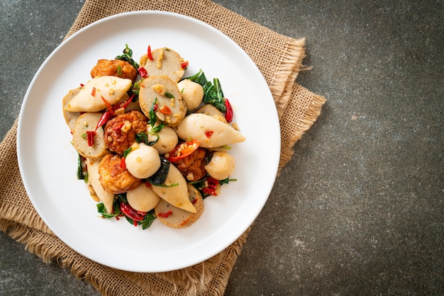 Spicy stir fried fish balls with herbs