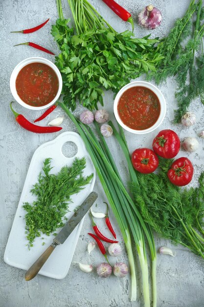 Spicy tomato sauce with herbs, Ketchup, Cooking, Gray background