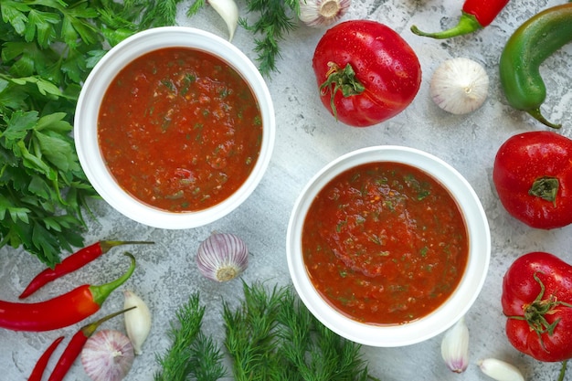 Spicy tomato sauce with herbs, Ketchup, Cooking, Gray background