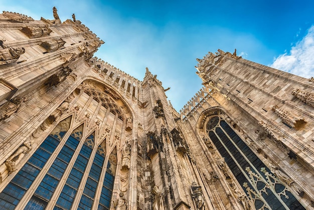 Spiers and statues on the gothic Cathedral of Milan Italy