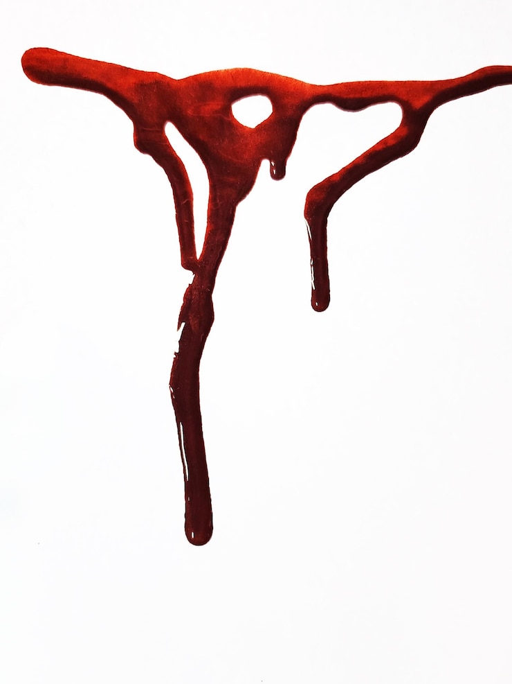 Photo spilled blood on a white background