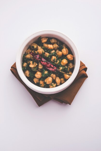 Premium Photo | Spinach chickpea dry curry / palak chana sukhi masala sabzi