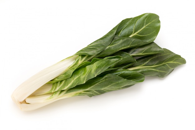 Spinach leaves close up isolated on white