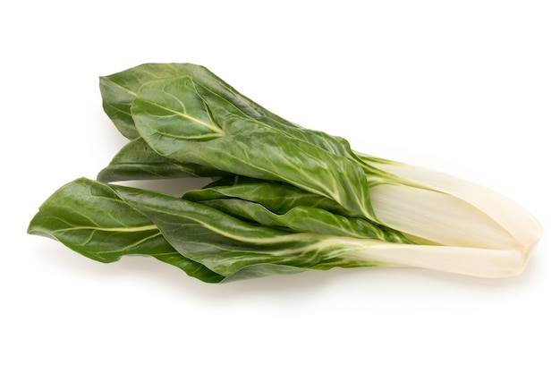 Photo spinach leaves close up isolated on white.