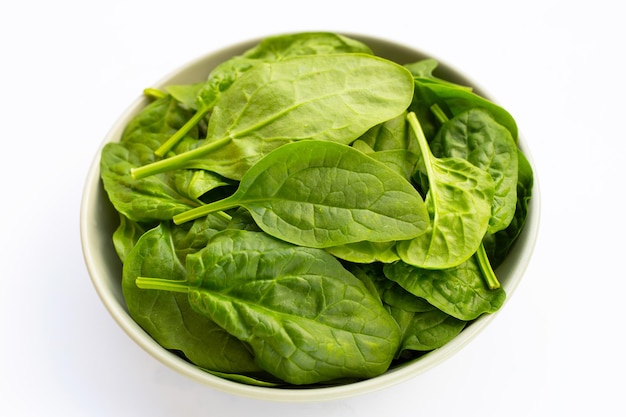 Spinach leaves on white background