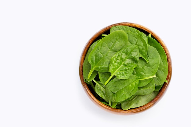 Spinach leaves on white background