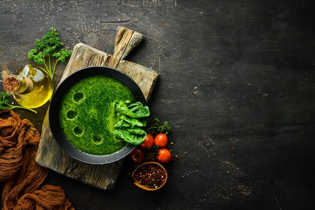 Spinach soup Healthy food Top view Free space for your text