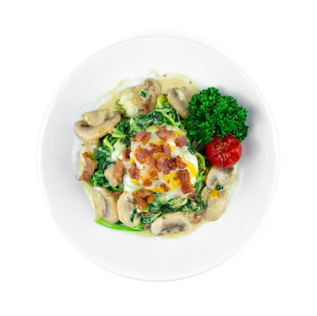 Spinach with Cream Sauce, Bacom Champignon Mushroom and Cheese Italian fusion Style Homemade dish decoration parsley and tomato topview